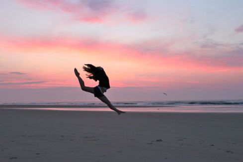 Dance leap on the beach